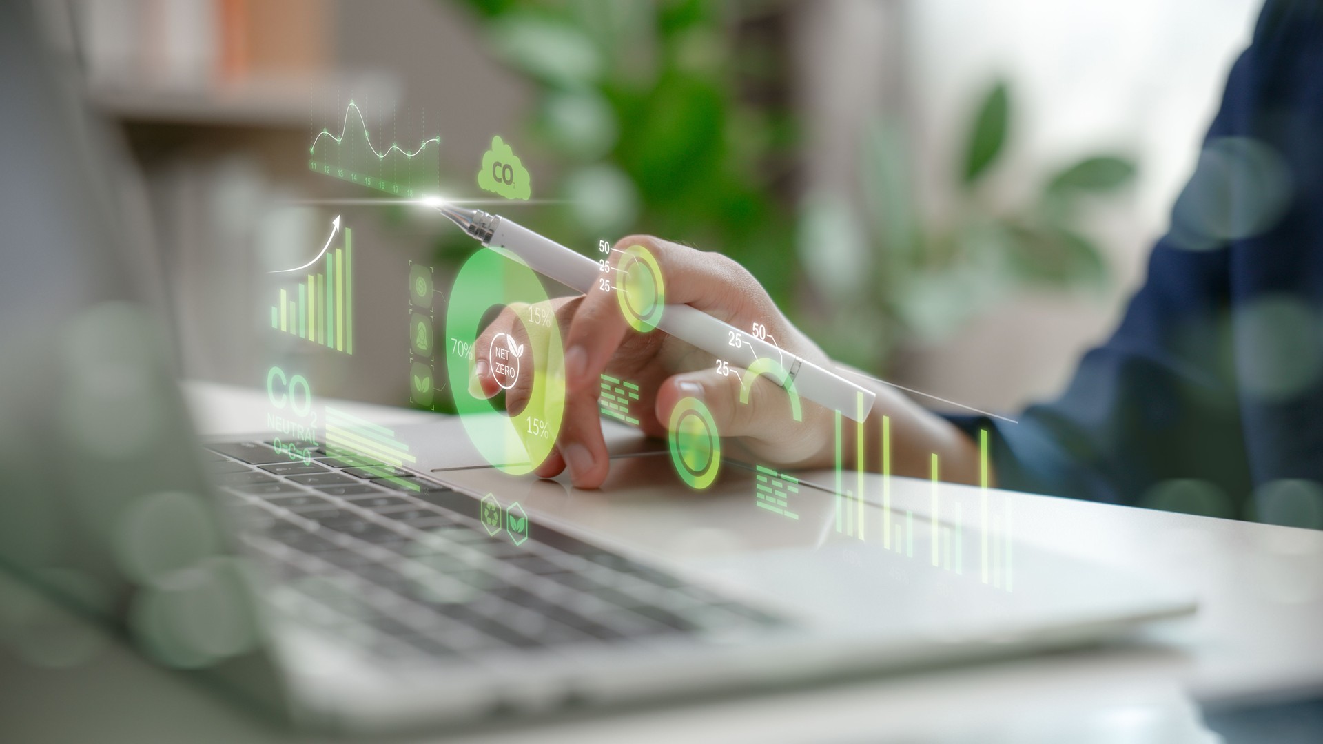 Hand analyzing environmental data with net zero dashboard, carbon footprint metrics, and green analytics. Concept of ESG, sustainability, eco technology, and digital climate solutions.