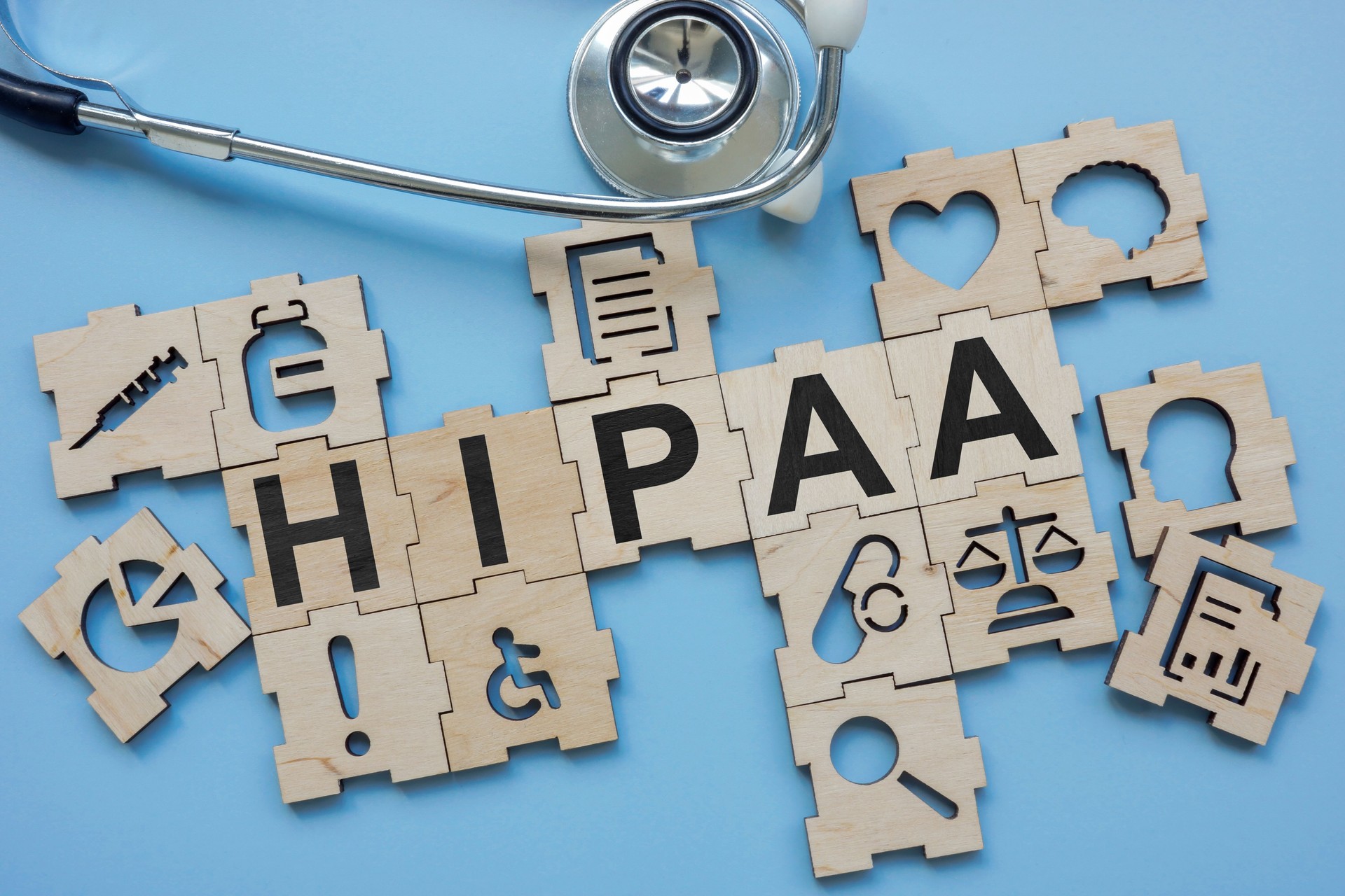 Stethoscope and medical puzzle with HIPAA Health Insurance Portability and Accountability Act.
