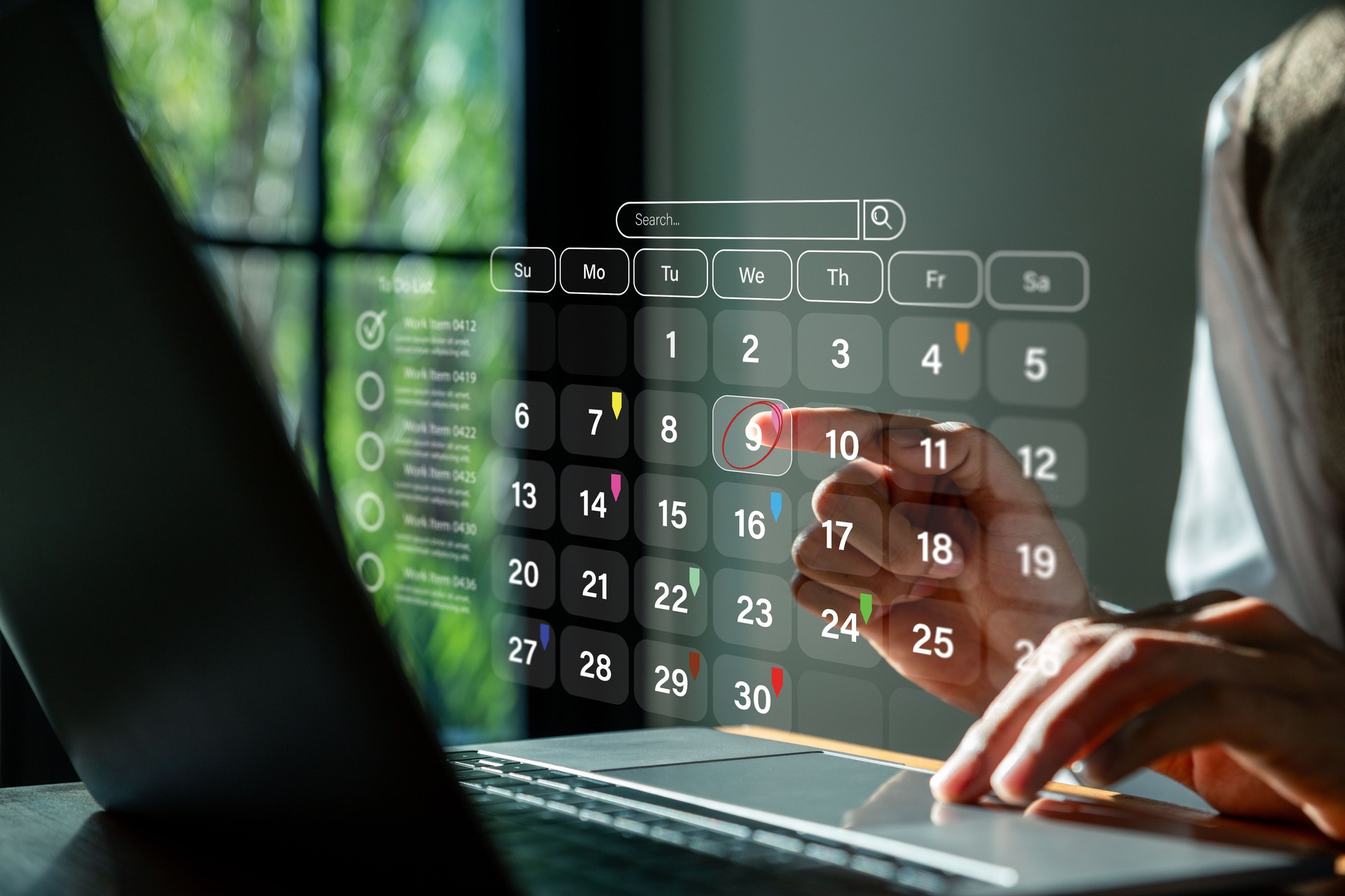 Businessman using laptop to highlight appointment reminders and meeting agenda.